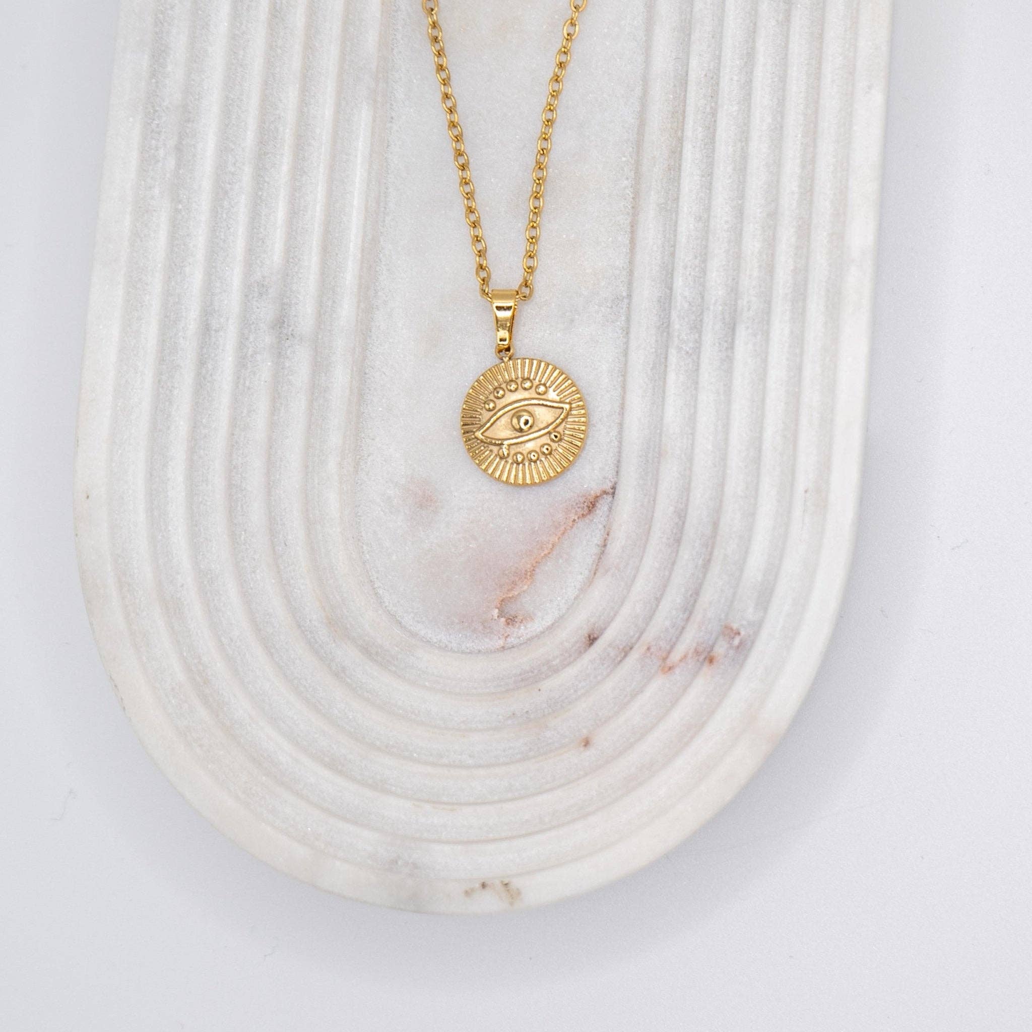 Necklace with "Devil's Eye" pendant made of 18-karat gold-plated stainless steel