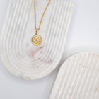 Necklace with "Devil's Eye" pendant made of 18-karat gold-plated stainless steel