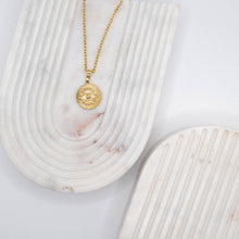 Necklace with "Devil's Eye" pendant made of 18-karat gold-plated stainless steel