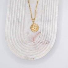 Necklace with "Devil's Eye" pendant made of 18-karat gold-plated stainless steel