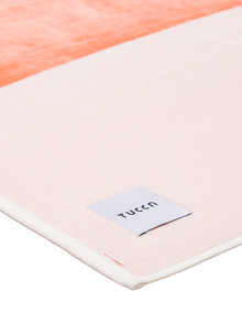 Premium Strandtuch aus 100 % Bio-Baumwolle mit Verbindungsfunktion – Tucca